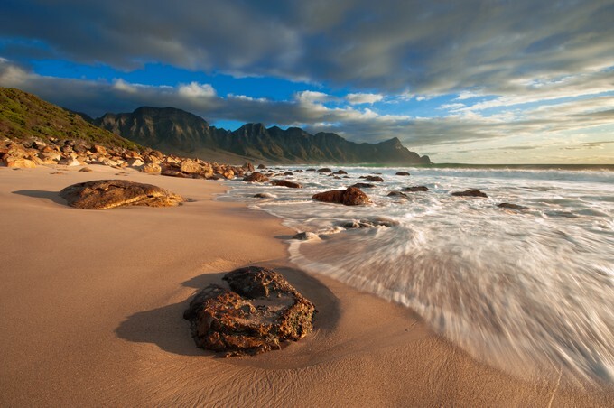 Waves wash up on the beach at Kogel Bay on the Cape Coastline